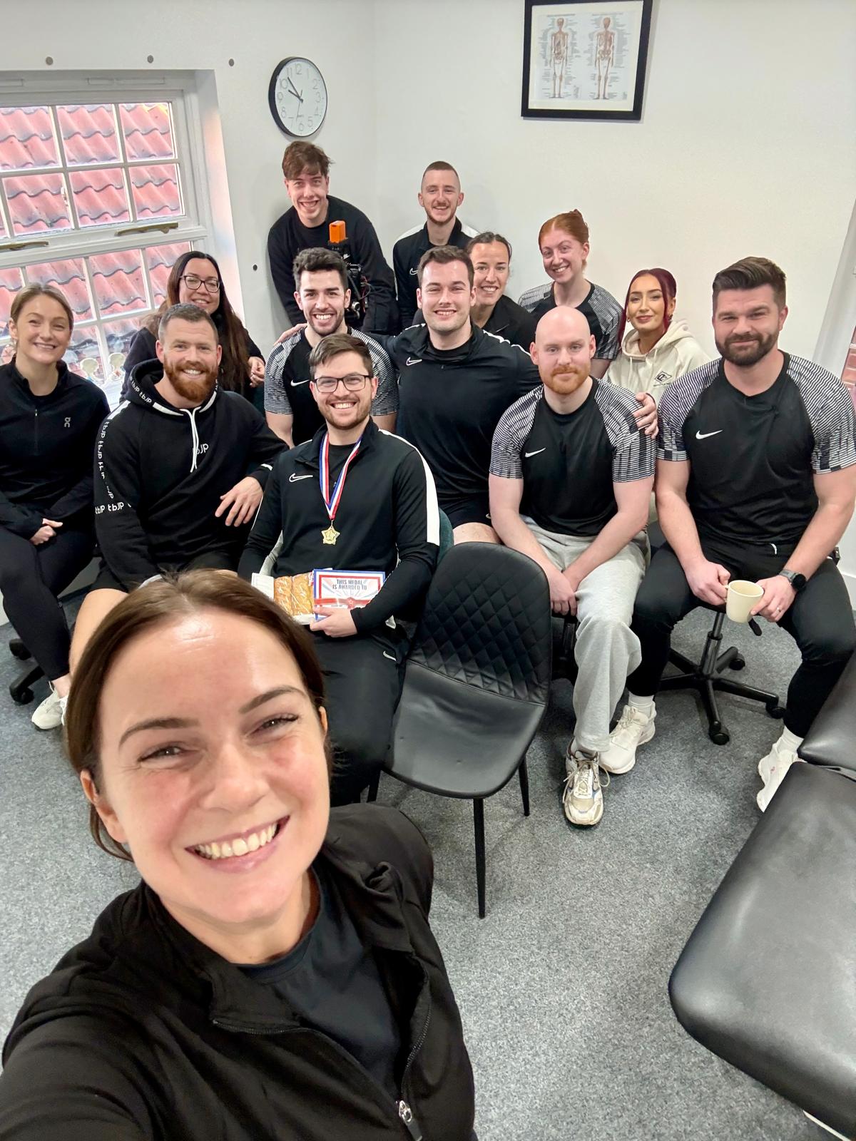 Joe Sharp, physio mentor and coach, leading a training session with the Sharp Physiotherapy team